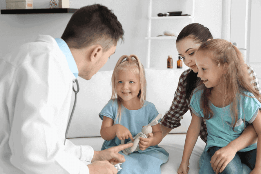 practitioner helping a family of three