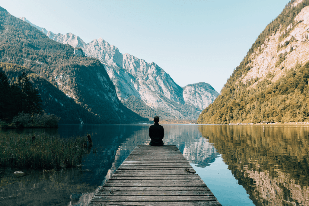 Man looking out over mountain