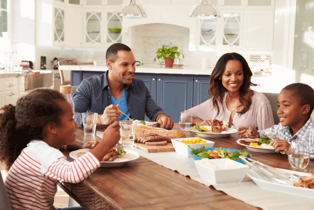 family at their dinning table eating