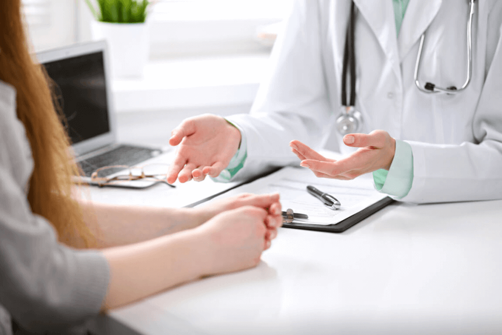 practitioner and patient talking