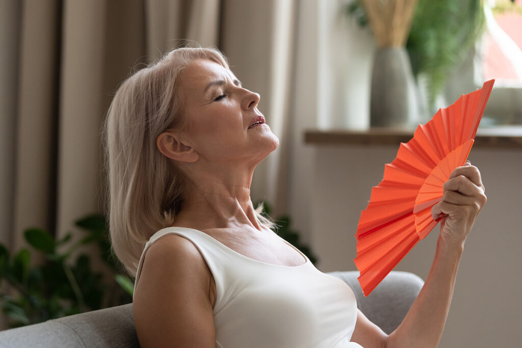 A woman experiencing a hotflash.