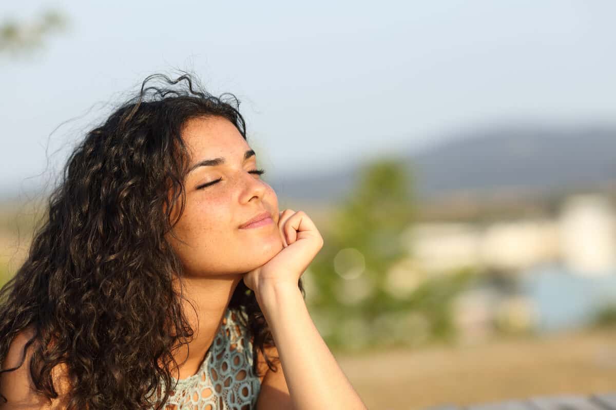 Woman smiling in the sun