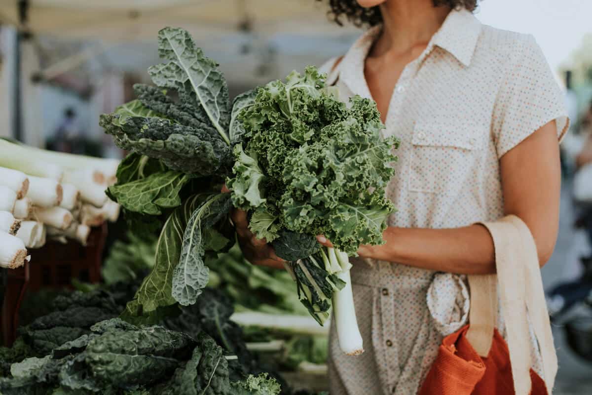 Woman holding fresh produce 