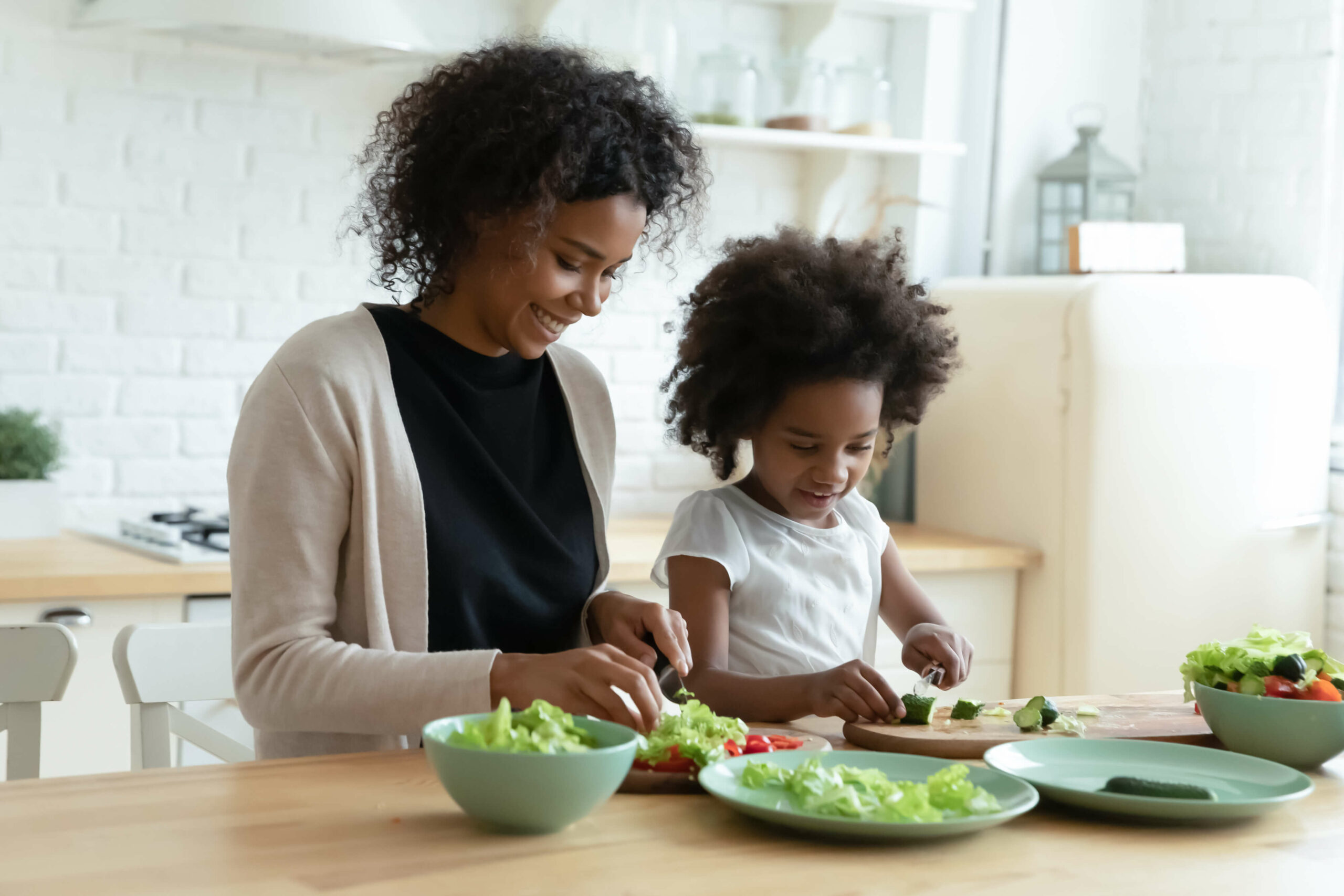 Woman and child cooking