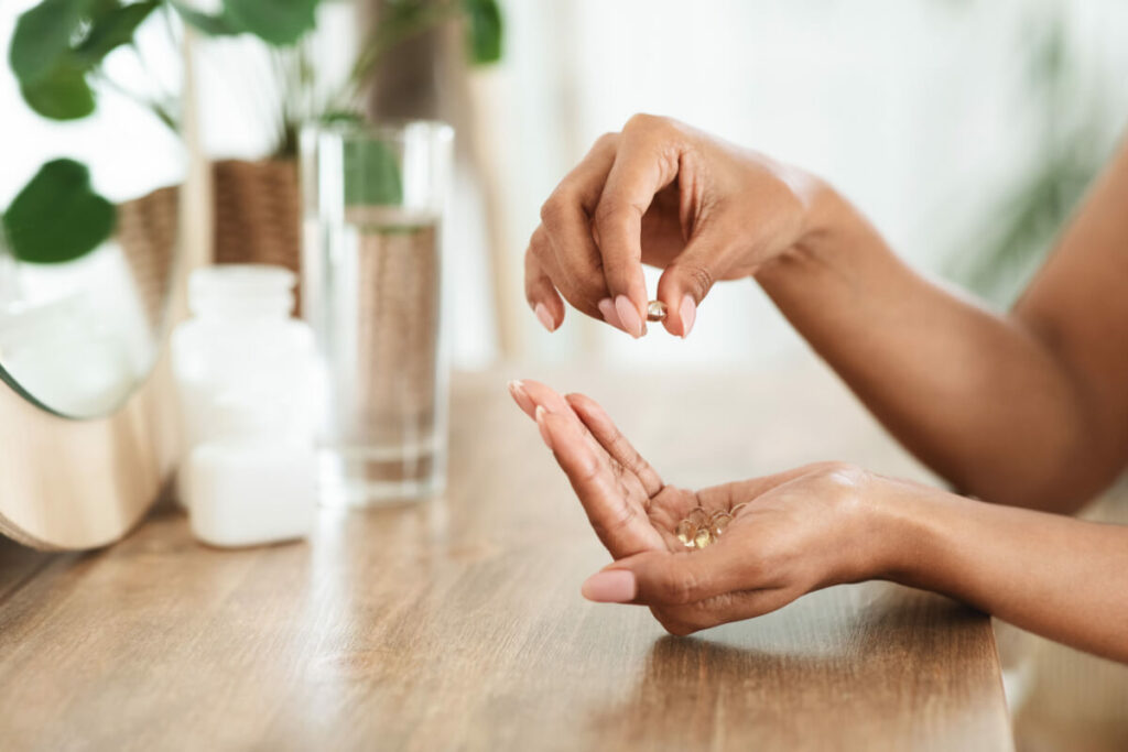 women holding supplements