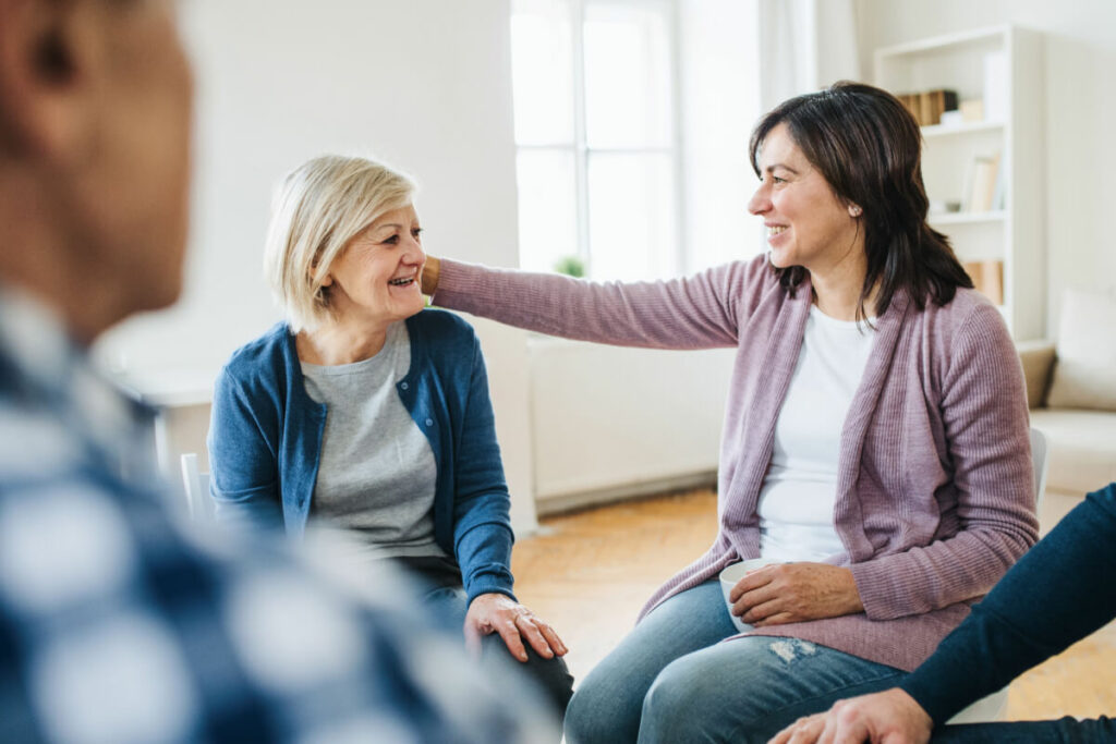 a group of people at a peer support group