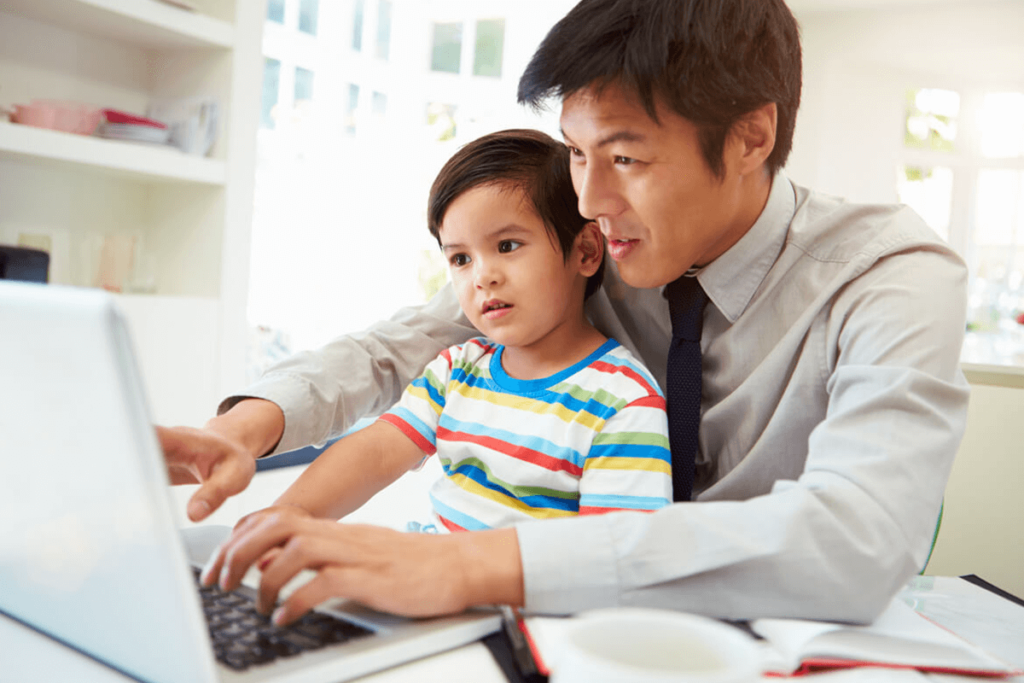 Father looking up supplements to destress with son