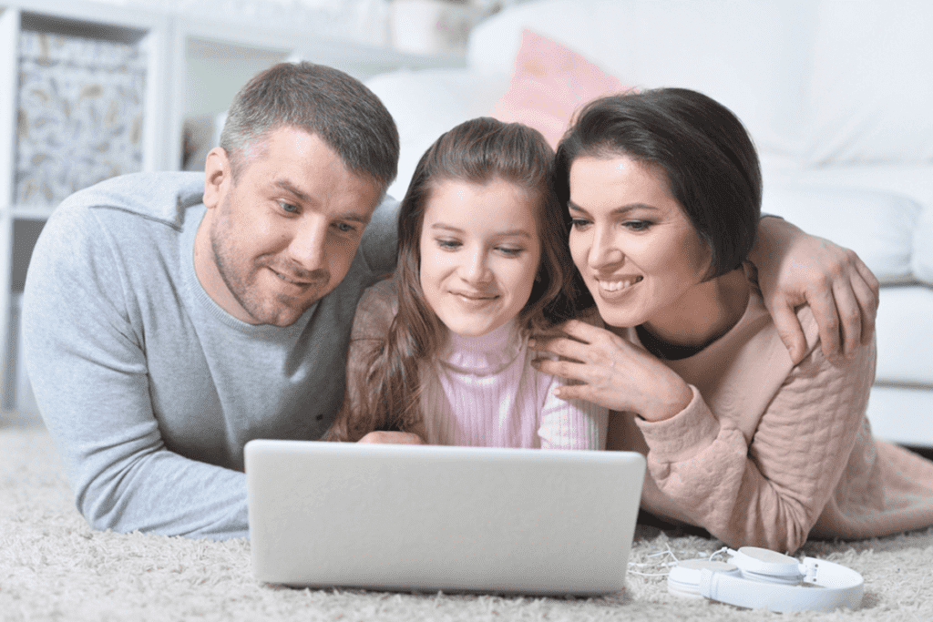 family reading a blog on an ipad