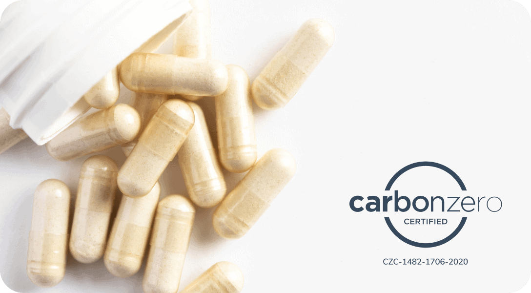 Supplement capsules spilled from a bottle