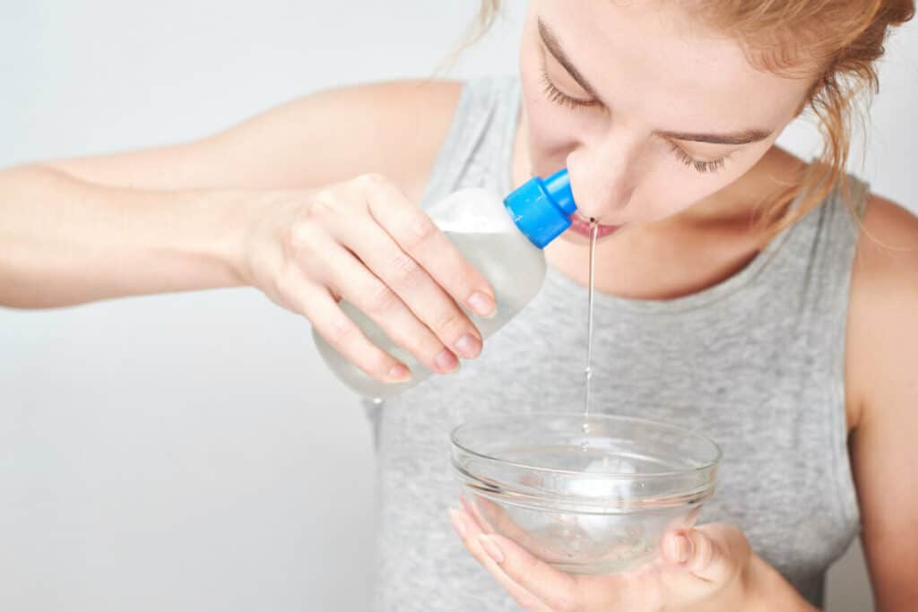 woman doing a saline wash