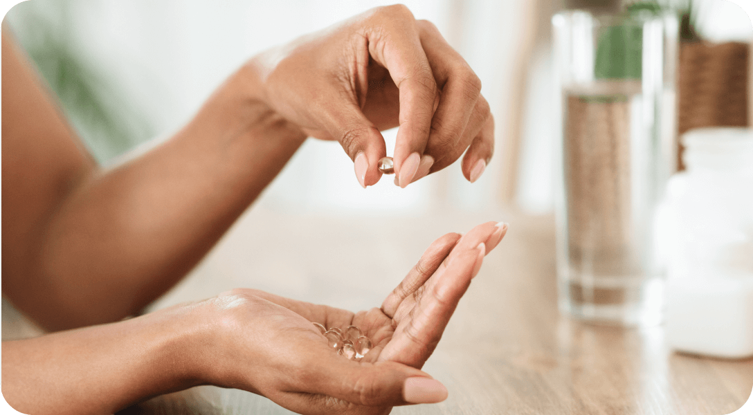 woman holding supplement in her hands