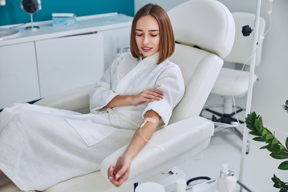 nurse practitioner administering an iv trip