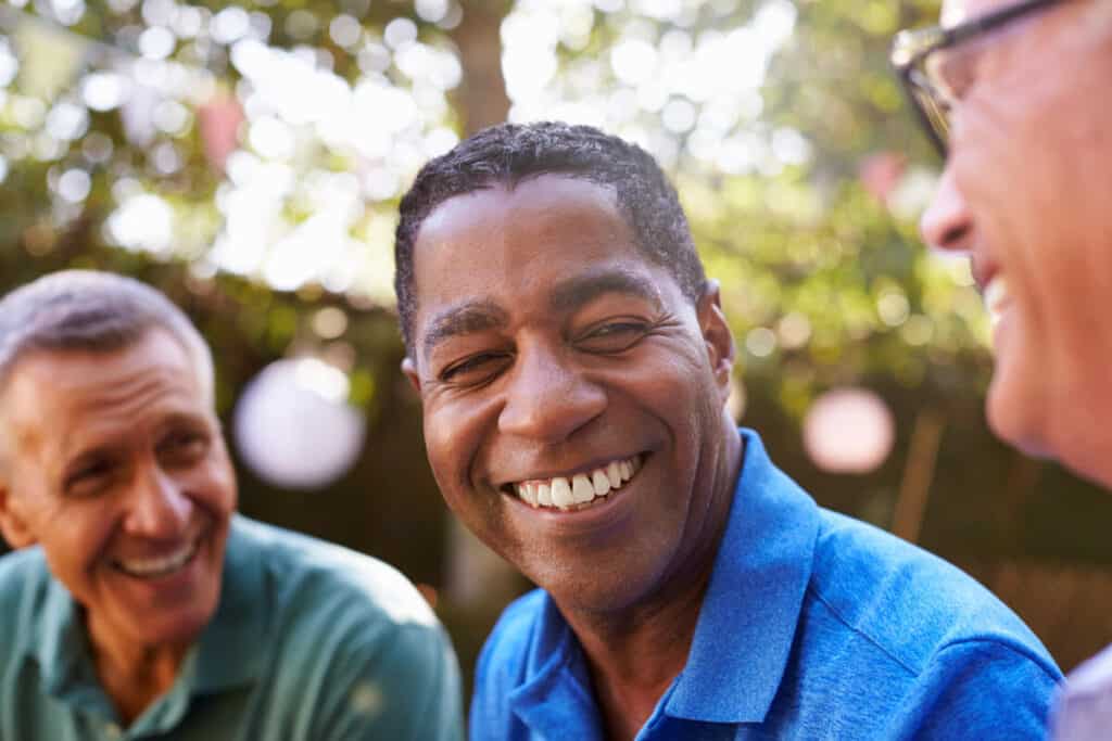 three men laughing