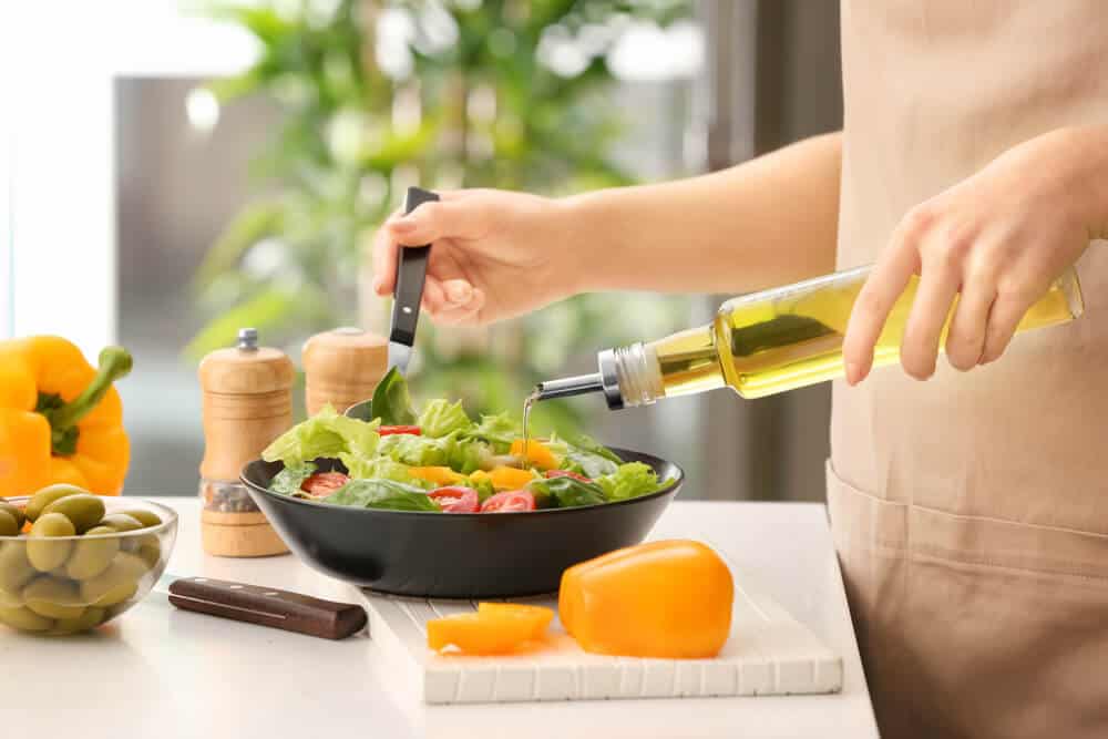 person preparing a salad